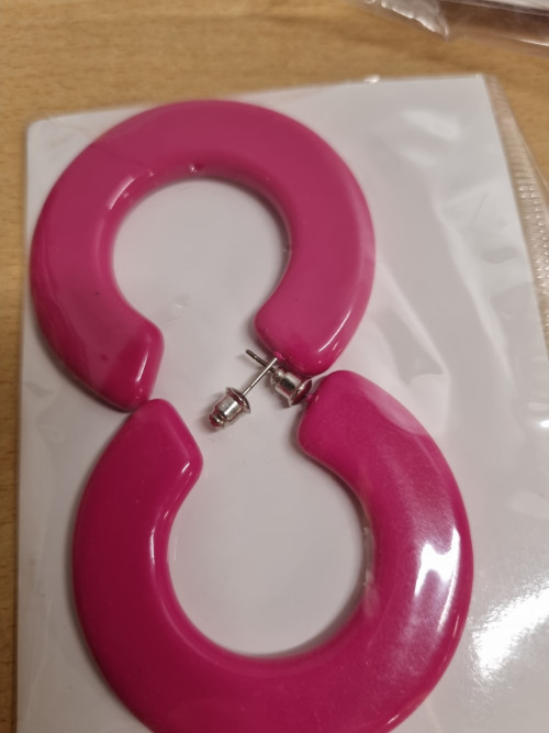 Oorbellen ringen roze paar