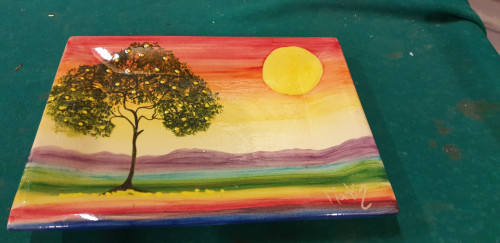 wandbord met boom en zon