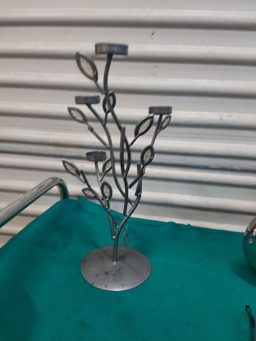 Waxinelicht houder in de vorm van een metalen boompje voor 4
