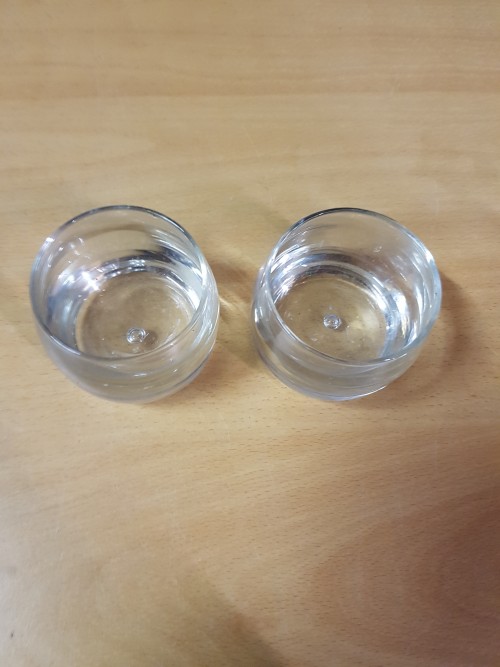 Waxinelicht houder van glas, rond, 2 stuks
