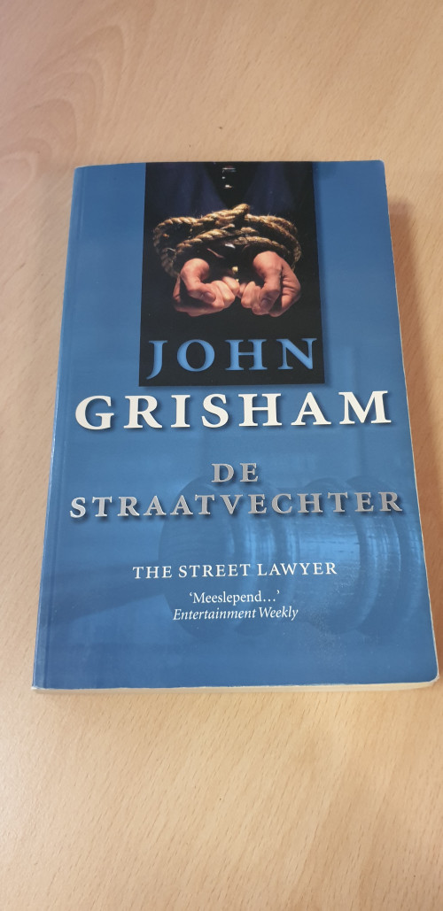 boek john grisham, de straatvechter