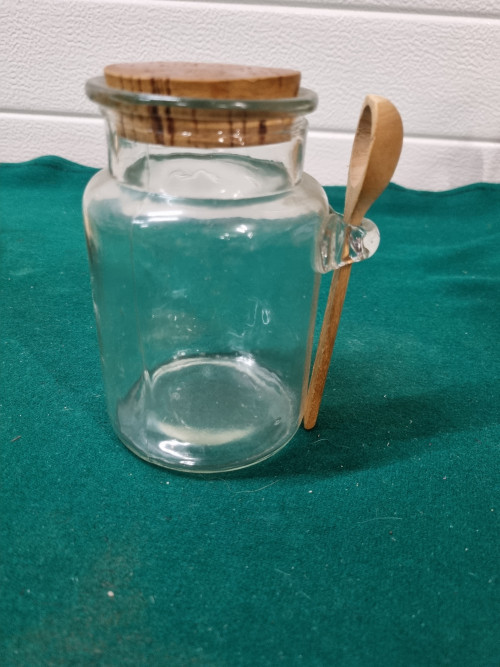 Honing of jam pot glas met lepel en dop